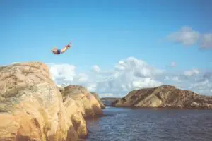 Jumping into water from cliff